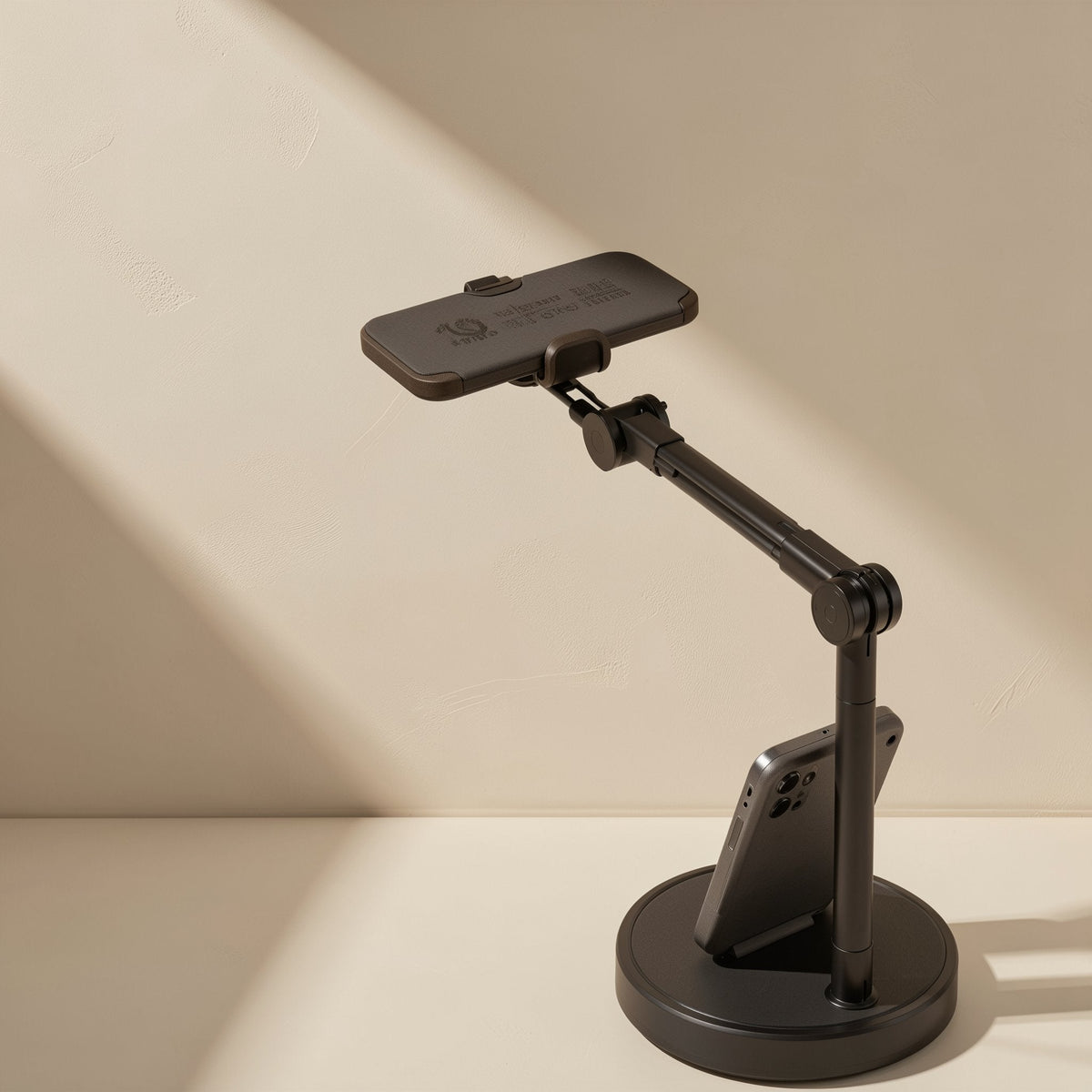 Streamstead Desktop Live Streaming Phone Stand in black with a phone clamped overhead on an extended arm