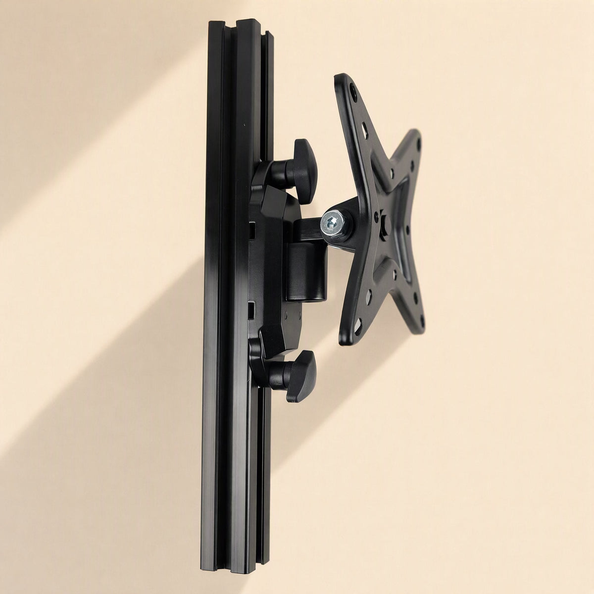 Wallbrace – Side view of the black mount clamped to a vertical aluminum profile rail with two T-handle screws