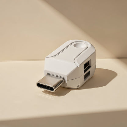 Readplug – White card reader standing on its USB-C plug, showing the SD and microSD slots on the side