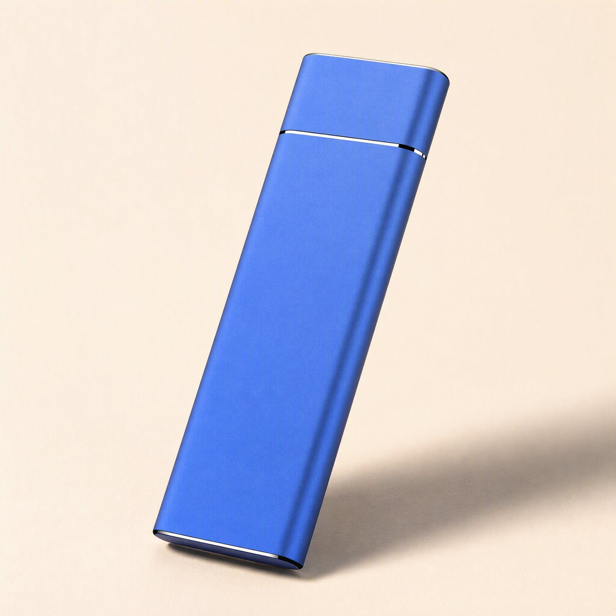 Driveglide M.2 Mobile Solid State Drive – blue brushed-metal portable drive tilted upright against a peach background