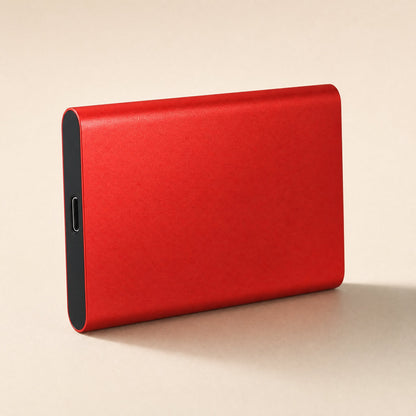 Steelsave – Red anodized metal portable drive standing on its edge, with the USB-C port visible on the black end