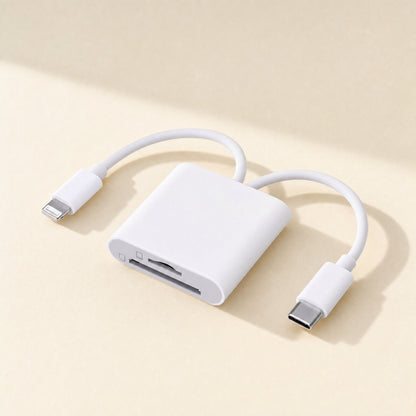 Bytebridge – Top-down view of the white card reader with Lightning and Type-C cables curved on a cream background