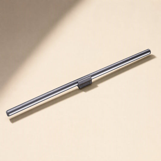 Alubeam – Rear view of a slim dark gray light bar with a small central mounting clip on a cream background