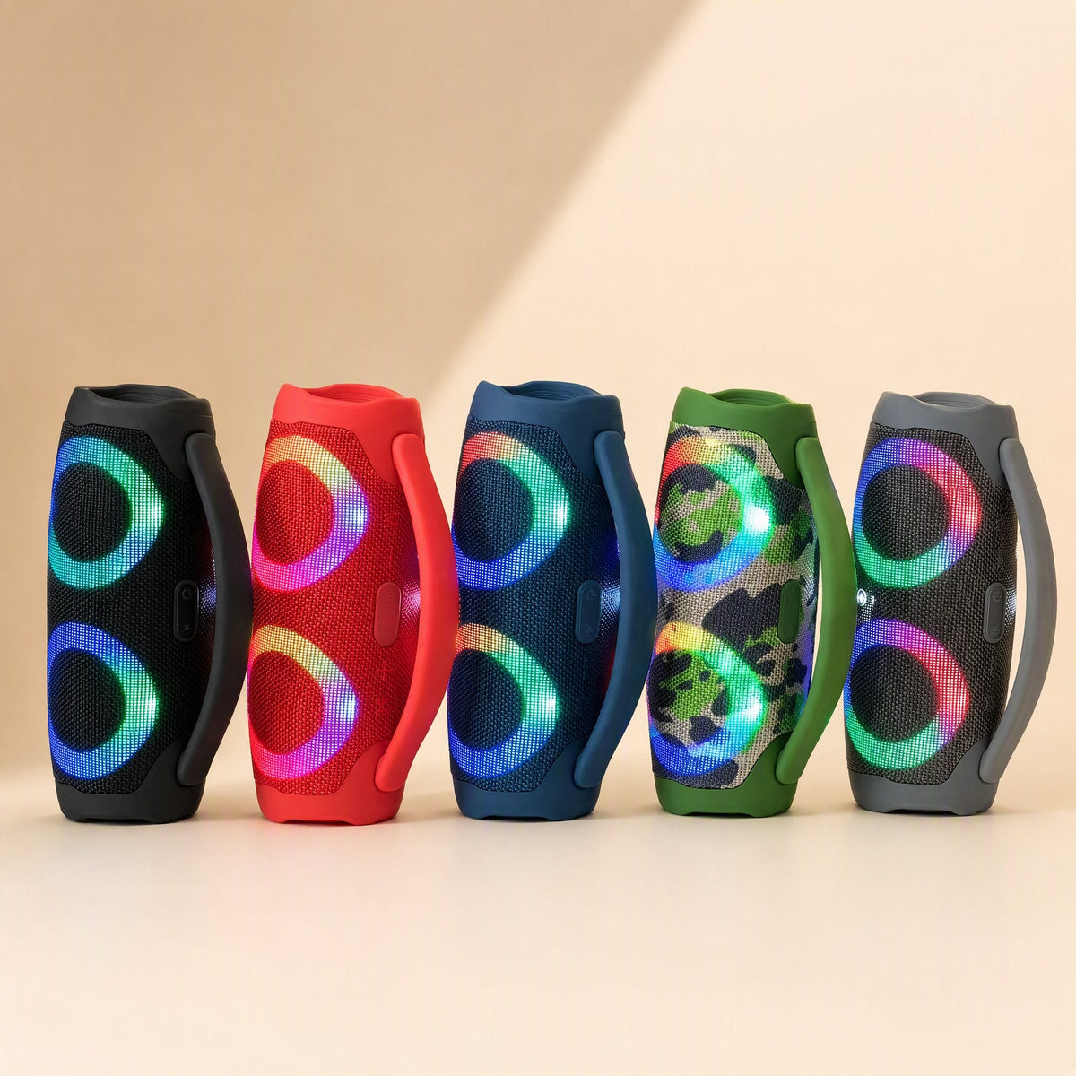 Portatune – Five upright speakers in black, red, blue, camouflage and grey, each with glowing multicolour light rings