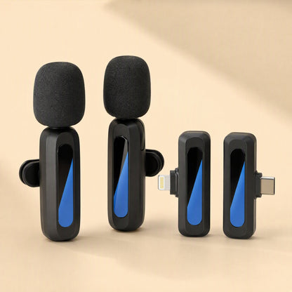 Livevoice – Two upright lavalier microphones with foam windscreens next to a Lightning receiver and a USB-C receiver