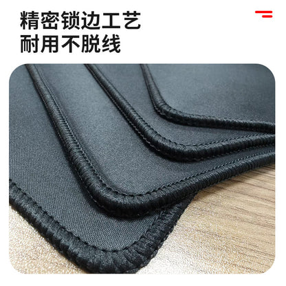 Dapple Desk Mat – black desk mat corners stacked to show the stitched, bound edges
