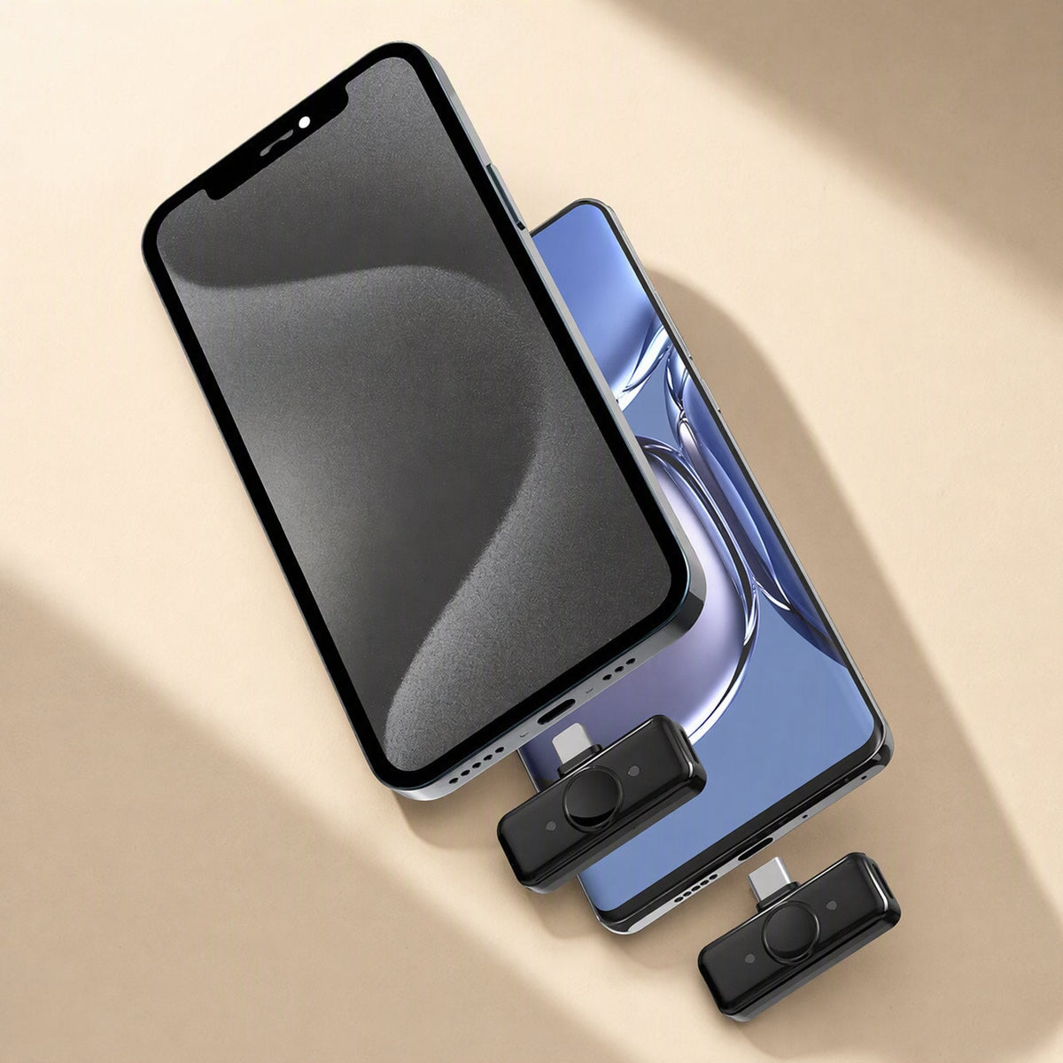 Lapelcast – Two USB-C receivers plugged into the bottom of a phone and a smartphone on a beige background