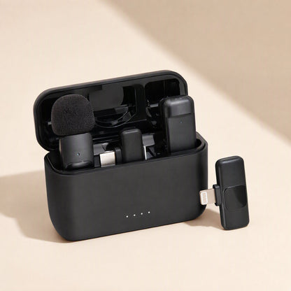 Lapelcast – Black charging case with foam-covered mic, receiver and a Lightning connector receiver beside it