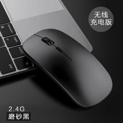 Optiglide Wireless Optical Mouse – matte black wireless mouse on a laptop keyboard, labeled 2.4G