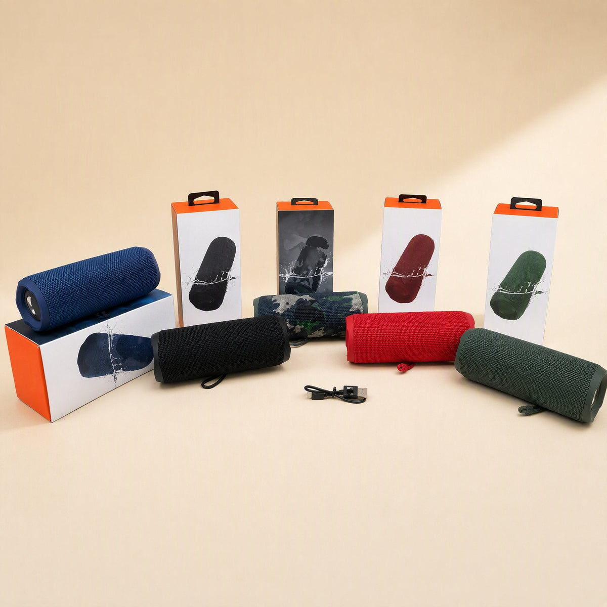 Splashbeat – Speakers in blue, black, camo, red and green beside their retail boxes and a USB charging cable