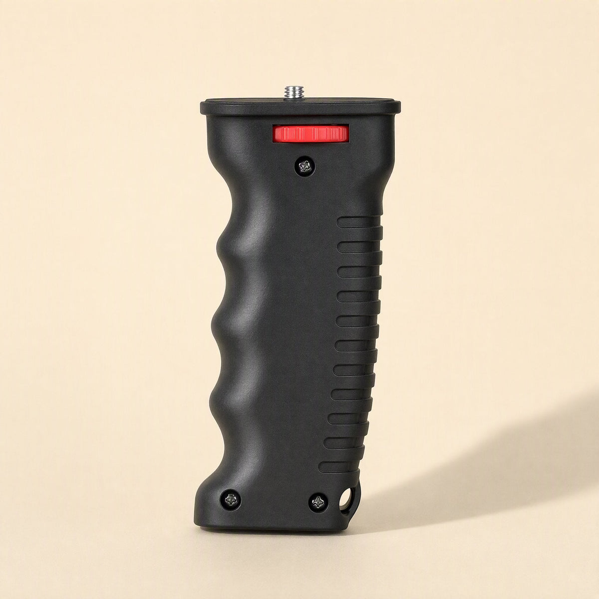 Steadyshot Handheld Phone Video Stabilizer, front view of black ribbed grip with red lock dial on beige