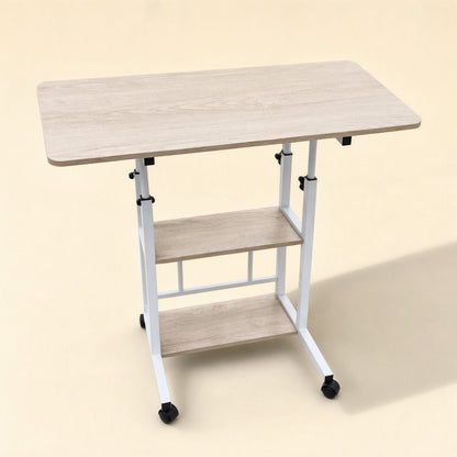 Rollrise Wheeled Adjustable Computer Desk in light oak with white frame and two shelves, angled view
