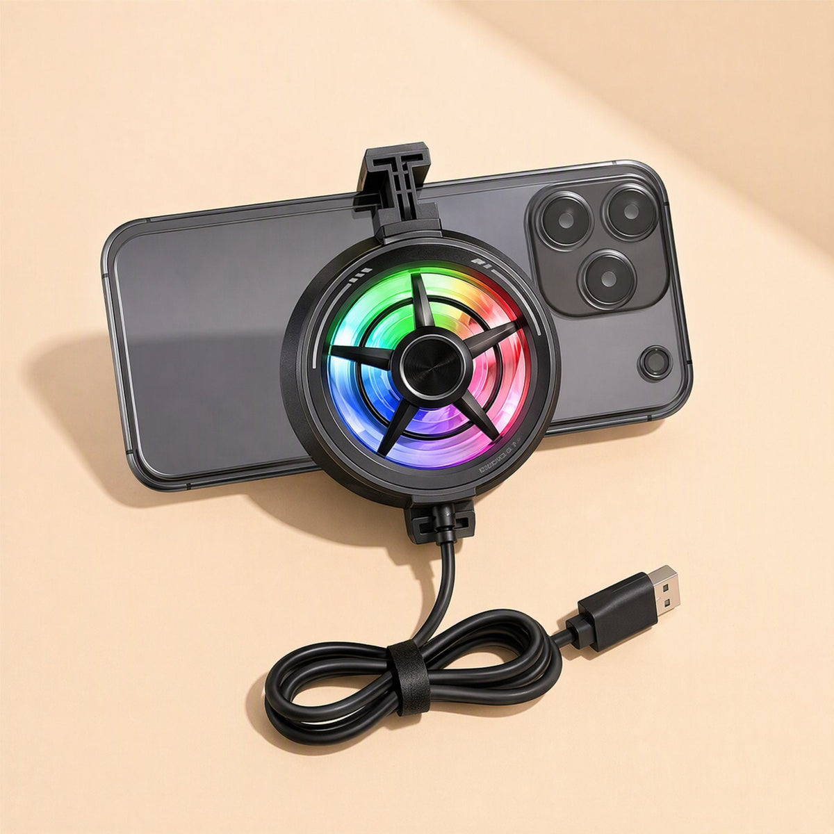 Breezecool – Black radiator clipped to the back of a smartphone, with its USB cable coiled and tied below