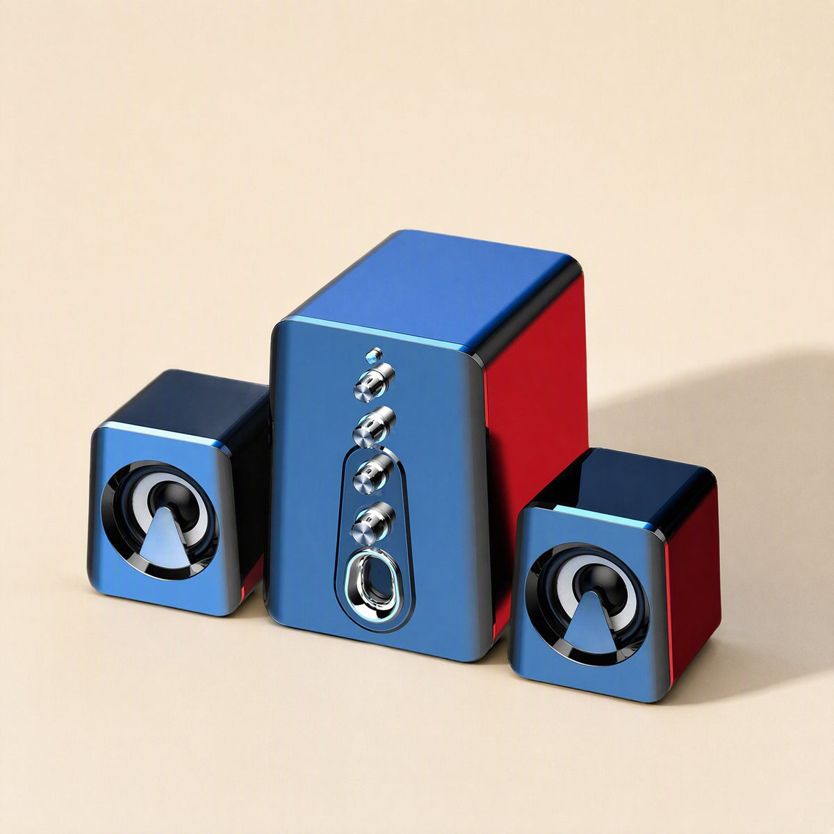 Deskchime – Blue and red two-tone speaker set, a tall subwoofer flanked by two small cube speakers on a tan background