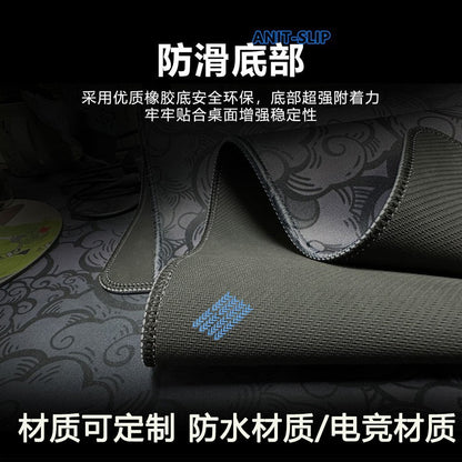 Gripprint – Folded corner of a mouse pad showing the textured non-slip rubber underside and stitched edge