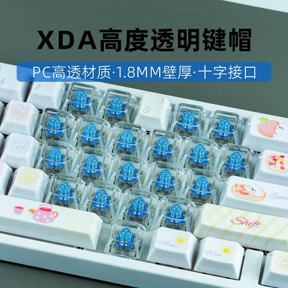 Clearcap – Close view of white keyboard with clear keycaps over blue switches beside pastel-printed keys