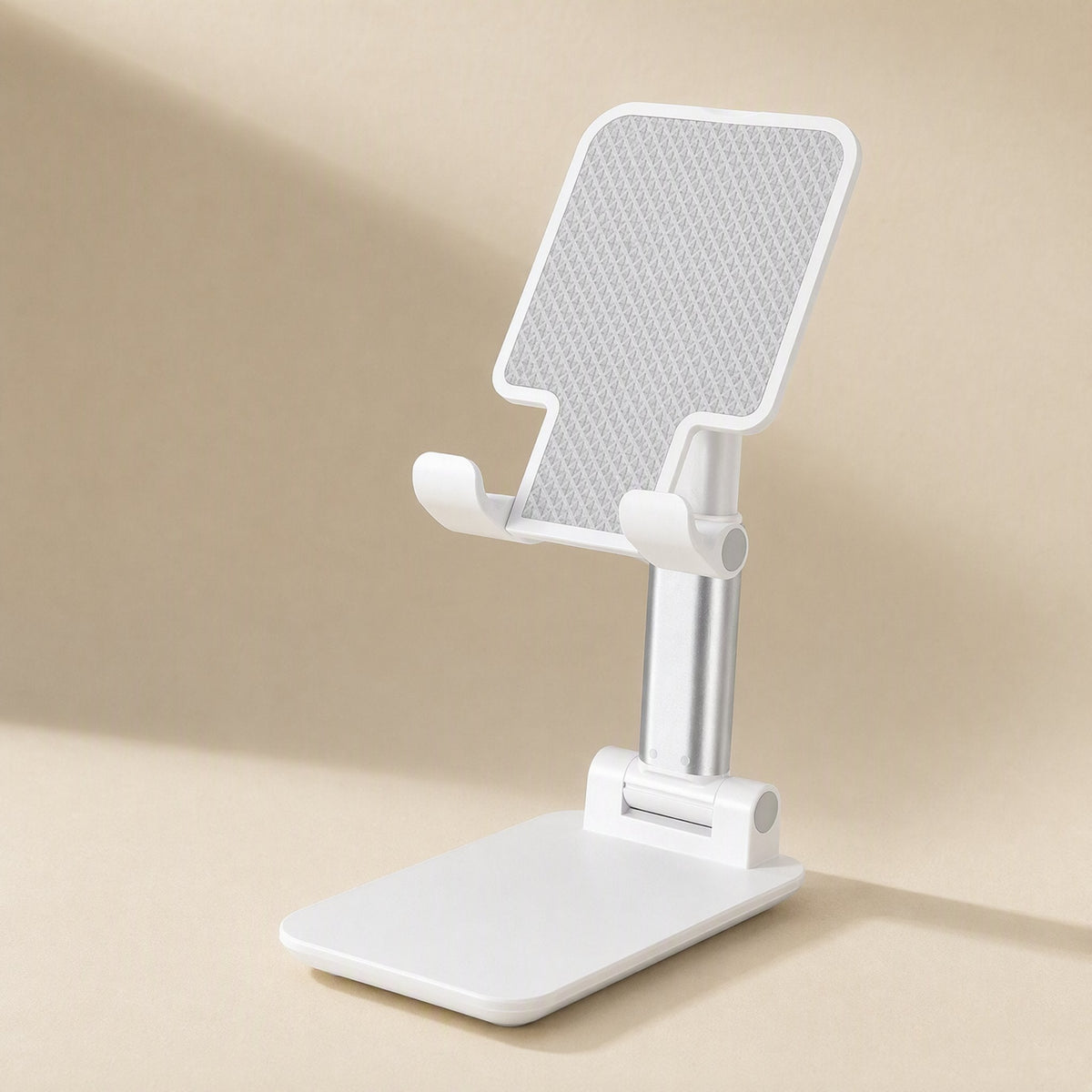 Flexperch Phone Stand – white adjustable desktop phone holder with silver column and textured grey backplate, angled view