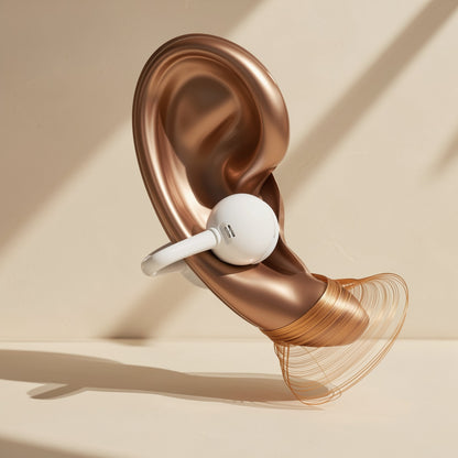 Clipbeat Clip-On Bluetooth Headphones – white clip-on earbud worn on a copper-toned ear model with sound-wave rings below it