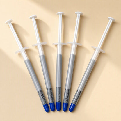 Heatbond – Five syringes fanned out side by side, showing measurement markings on the barrels