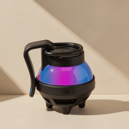 Black Cardchime speaker, side view with USB-C port and blue-to-purple gradient dome
