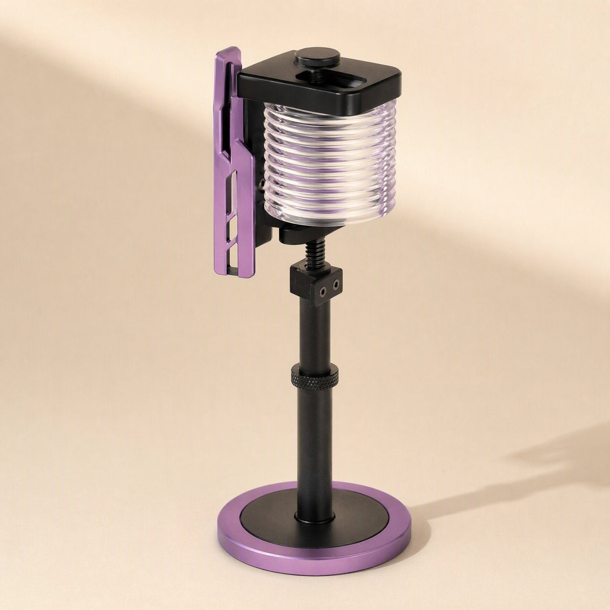 Magclamp – Purple and black graphics card holder with ribbed clear cylinder and tall slim post on a round base