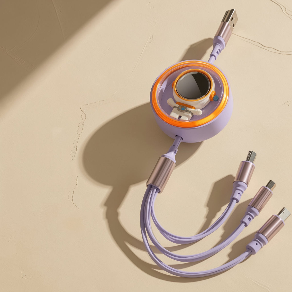 Pullcharge Retractable 3-in-1 Charging Cable in lavender with astronaut window, three connector tips fanned out