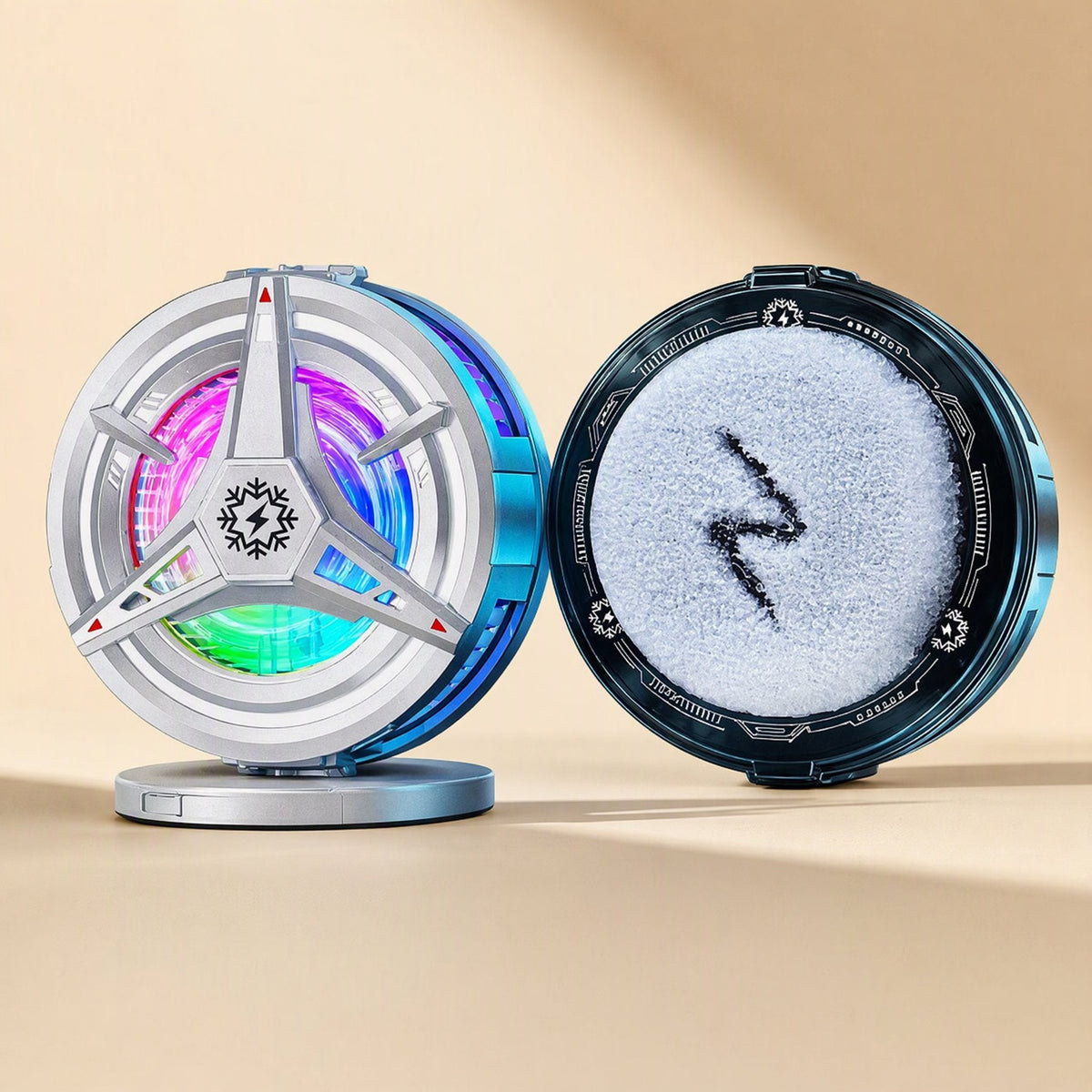 Cooldial – Silver cooler on a round stand beside a blue-rimmed fuzzy contact pad, RGB light glowing through the fan