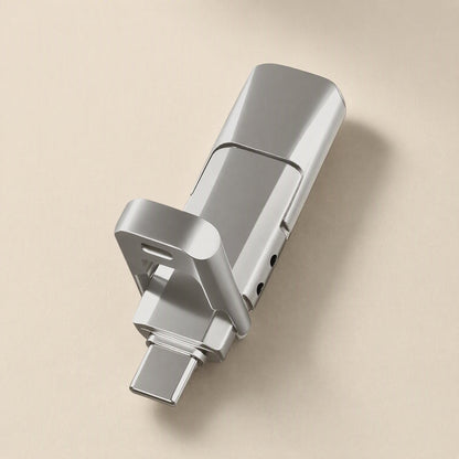 Pivotflash – Top-down view of a silver metal flash drive with the USB-C plug extended and the pivot frame lifted