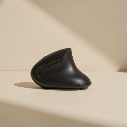 Palmglide – Rear three-quarter view of the black vertical mouse showing side buttons and thumb curve in soft light