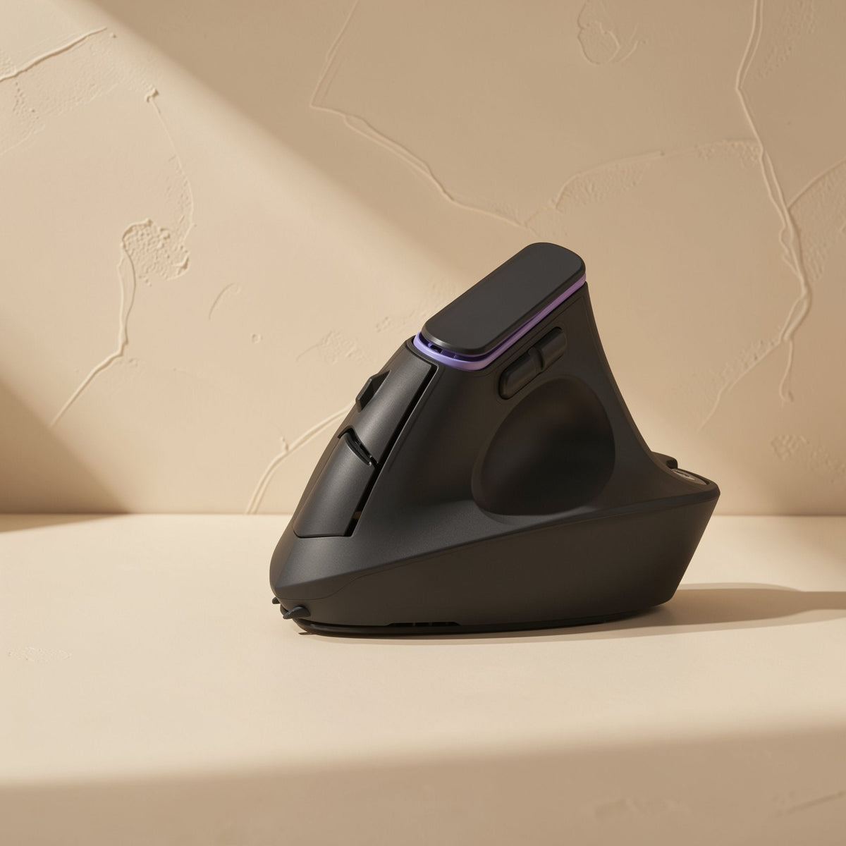 Ergohover Vertical Wireless Ergonomic Mouse in black, side view with purple light strip on a beige background