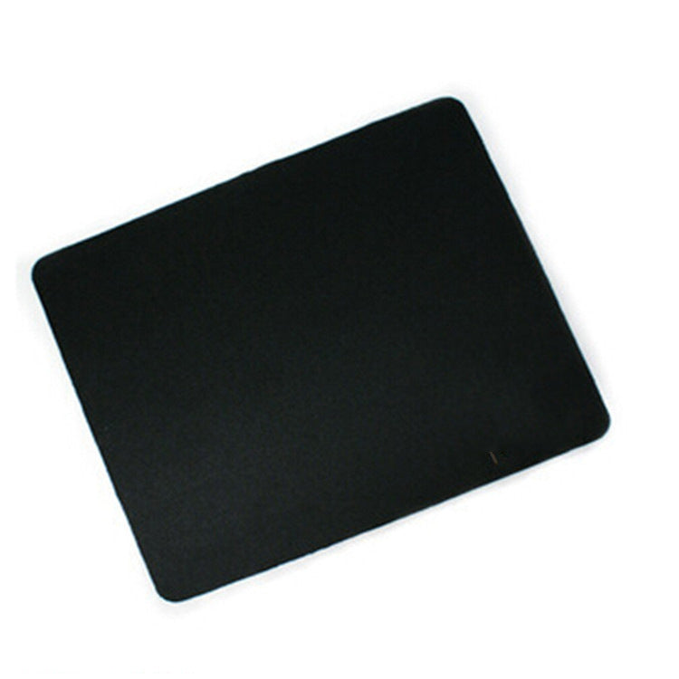 Blackmat Small Black Mouse Pad with rounded corners at an angle on a plain white background