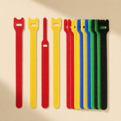 Loopstem T-Shaped Nylon Hook-And-Loop Cable Tie in red, yellow, blue, green and black on a cream background