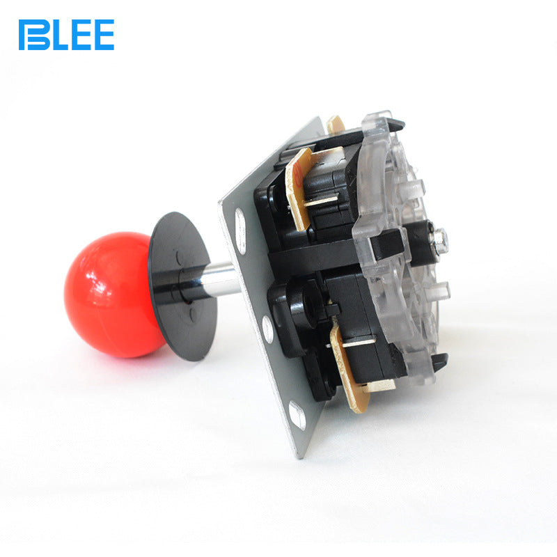 Rockerest – Angled view of the joystick's underside showing black switches, clear housing and a black dust washer