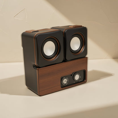 Desktune Mini Computer Speakers – two black cube speakers stacked on a walnut-look base with two control knobs on the front