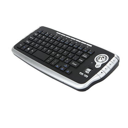 Keytrail – Black and silver mini keyboard with trackball and scroll wheel, seen from the right at an angle