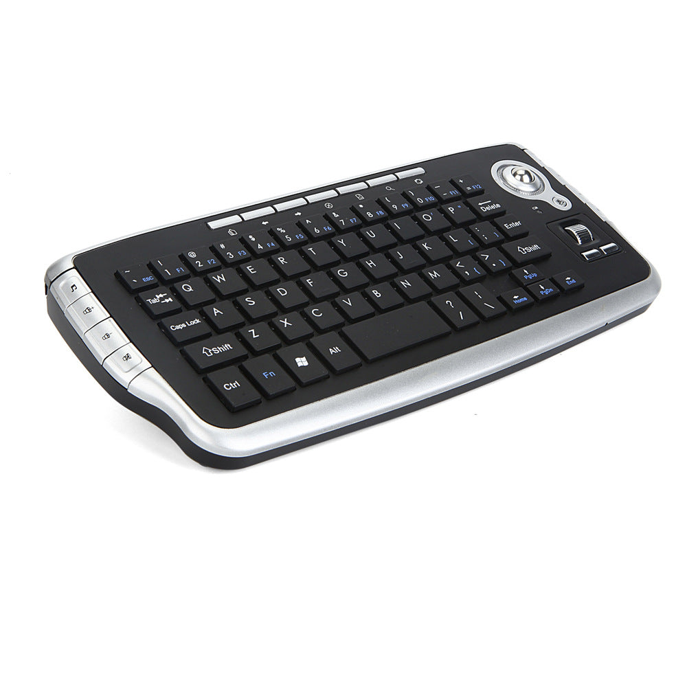 Keytrail – Compact black keyboard with silver edges and side buttons, viewed from the front left corner