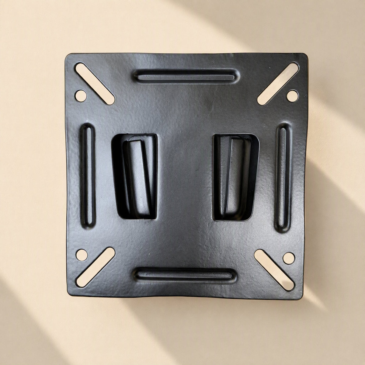 Viewbrace 14–24 Inch LCD Monitor Wall Mount, black iron wall plate seen from the front with slotted holes