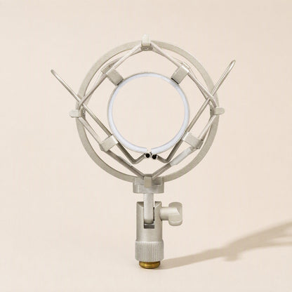 Shockbrace – Silver metal shock mount with a round white-lined cradle and brass threaded base, front view
