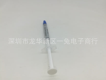 Thermend – Syringe standing nearly upright with white plunger at bottom and blue cap on top, gray label reading Thermal