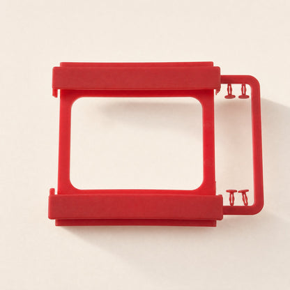 Driveclip Plastic 2.5 to 3.5 Inch Drive Bracket in red, empty frame viewed from above on a cream background
