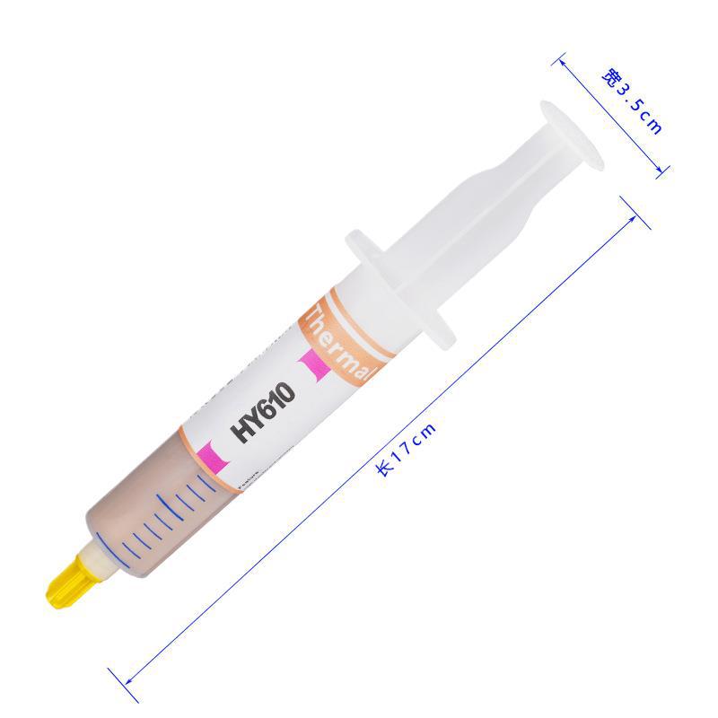 Goldglide Thermal Paste – large thermal paste syringe with orange label and pink accents, marked 17 cm long and 3.5 cm wide