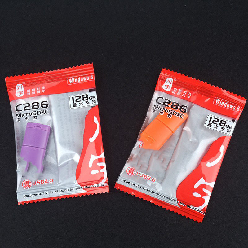 Memport – Purple and orange card readers in red retail packaging marked C286 MicroSDXC, 128GB max, USB 2.0