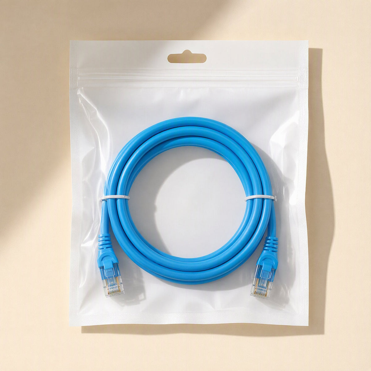 Shieldlink Cat6 Network Cable – blue Cat6 cable coiled inside a clear resealable plastic bag with a hang hole