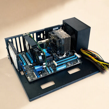 Servernest – Open frame with ATX motherboard, tower cooler, hard drive and power supply with cables, seen at a slight angle