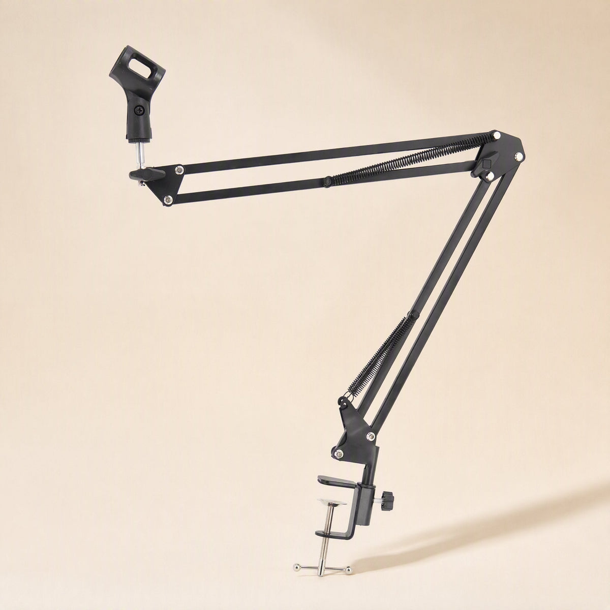 Reacharm – Boom arm extended horizontally with mic holder at the left and desk clamp at the bottom