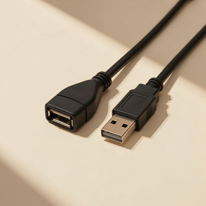 Reachcord – Top-down view of both cable ends, the female USB-A socket beside the male plug, on a beige background
