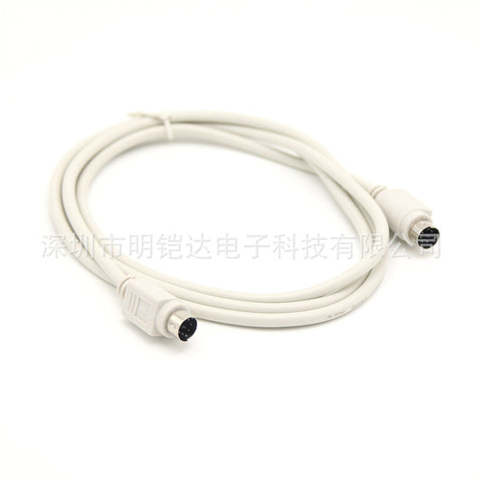 Keyloom – Coiled white PS2 cable seen from a higher angle, with a six-pin male connector at each end