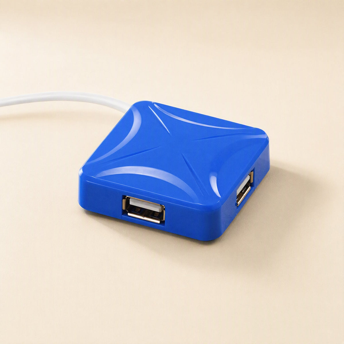 Portcluster USB 2.0 Four-Port Hub in blue with ports on two sides and a white cable trailing off