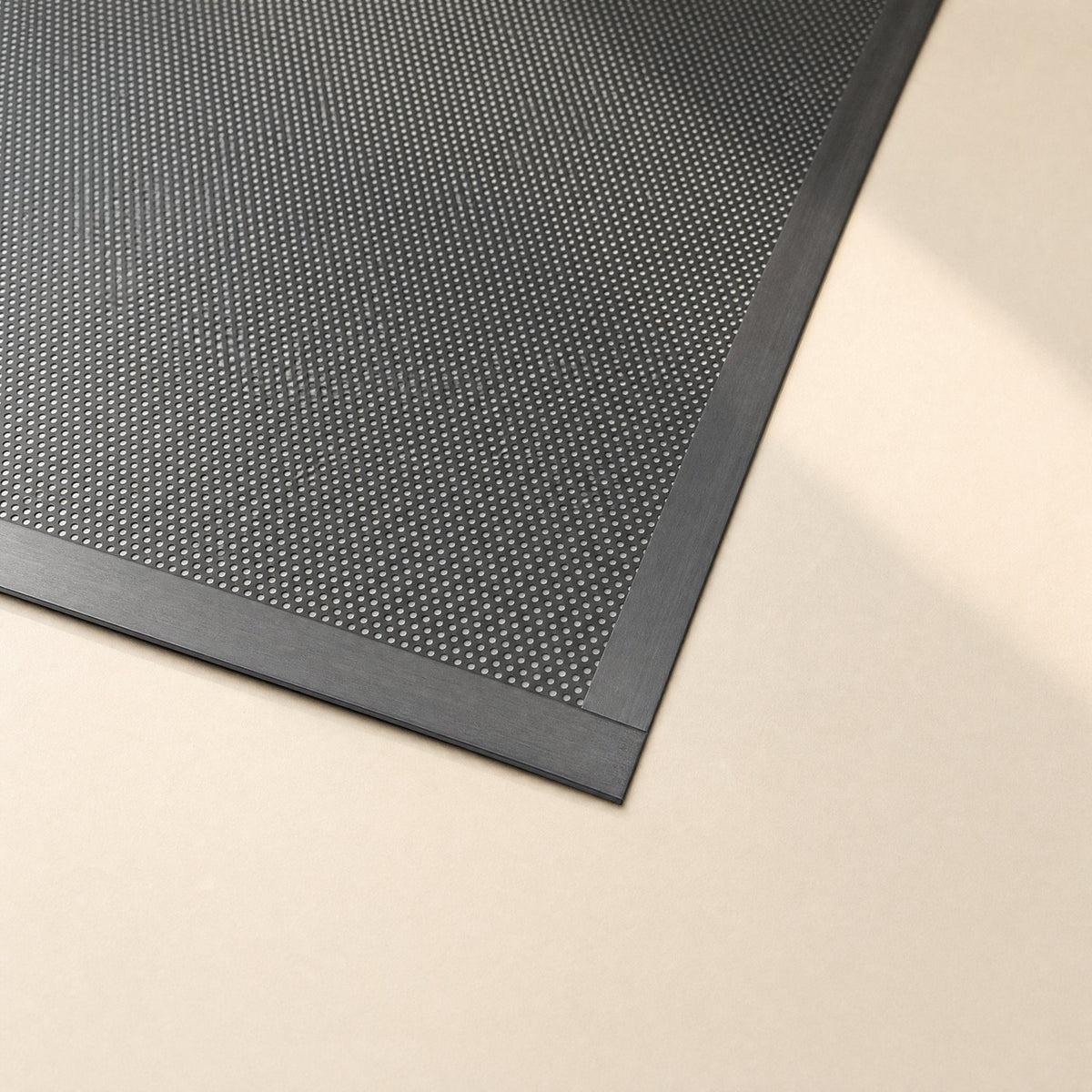 Magmesh PVC Magnetic Chassis Fan Filter Net – close-up of a black perforated mesh corner with a flat magnetic border strip
