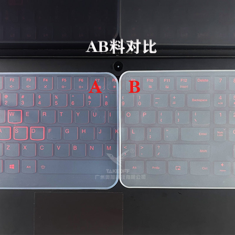 Keyfend – Two film samples, labeled A and B, side by side on a laptop keyboard for material comparison